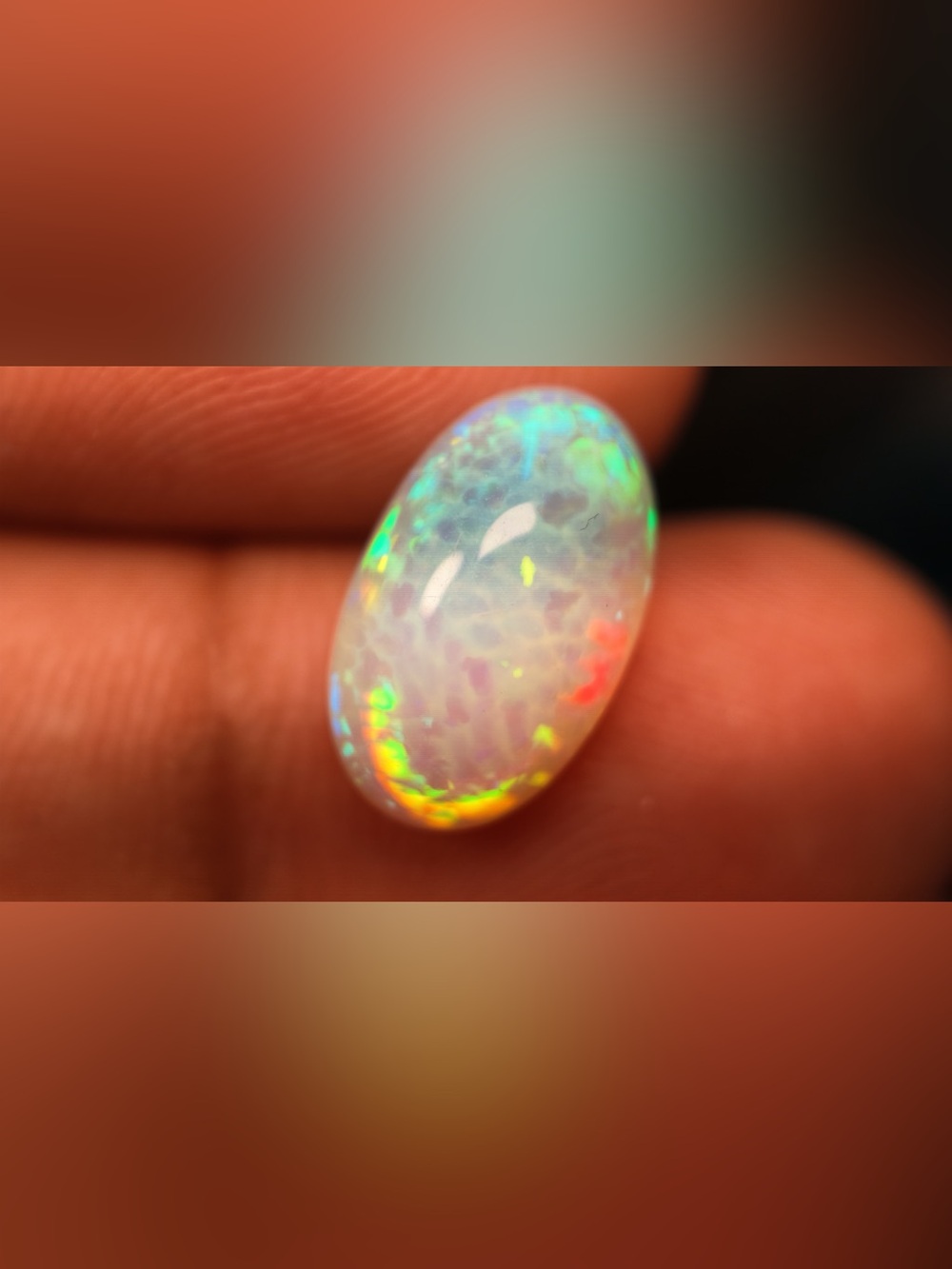 Natural Ethiopian White/Multicolor Opal Oval Cabochon 14.26x8.93mm 3.5 carat